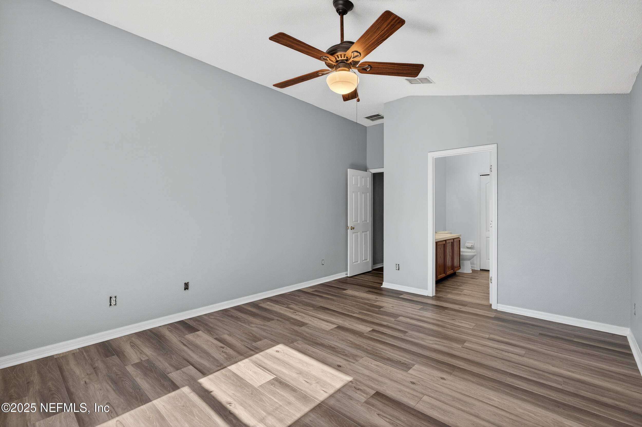 10174 Rising Mist Lane Jacksonville, FL 32221 - Photo 19 of 31 a view of an empty room with a window