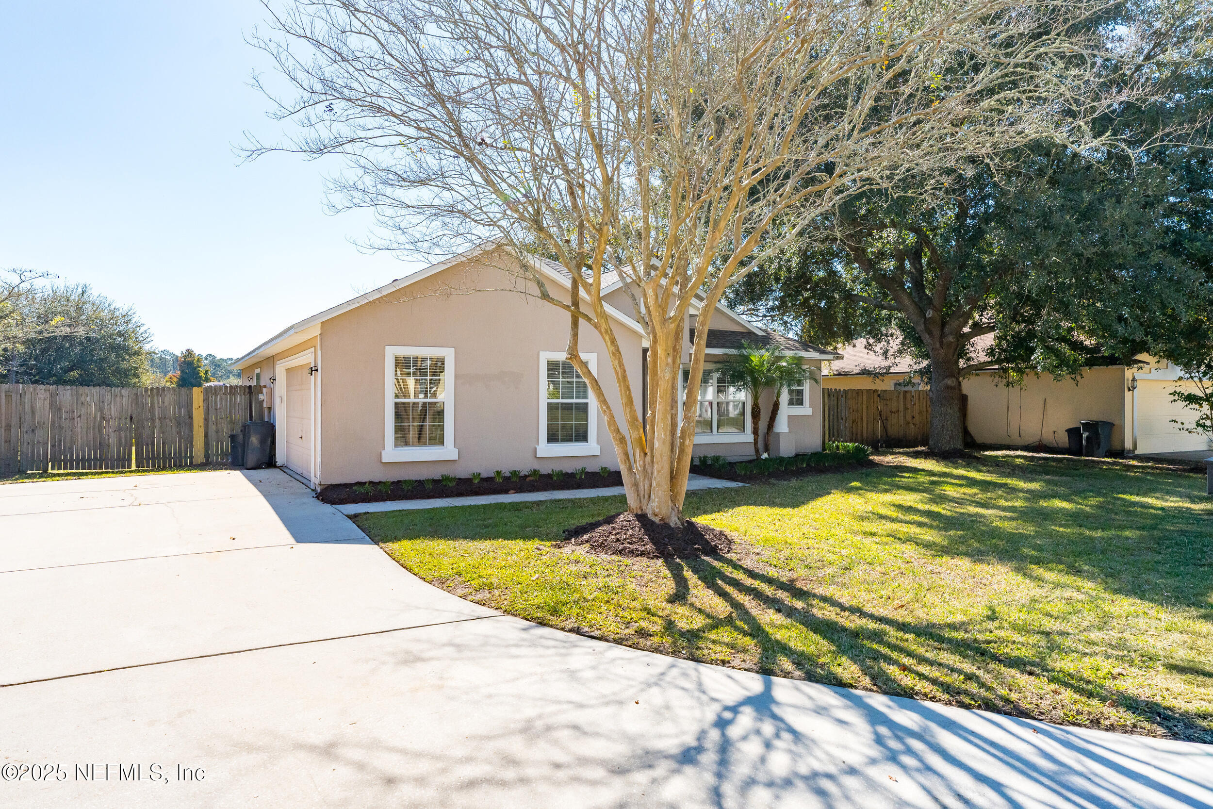 10174 Rising Mist Lane Jacksonville, FL 32221 - Photo 2 of 31 a view of a house with pool and a yard