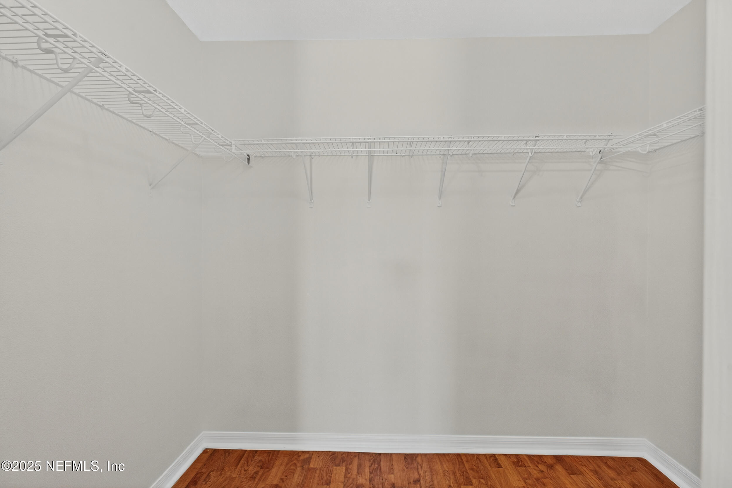 10174 Rising Mist Lane Jacksonville, FL 32221 - Photo 23 of 31 a view of small space with racks on the wall