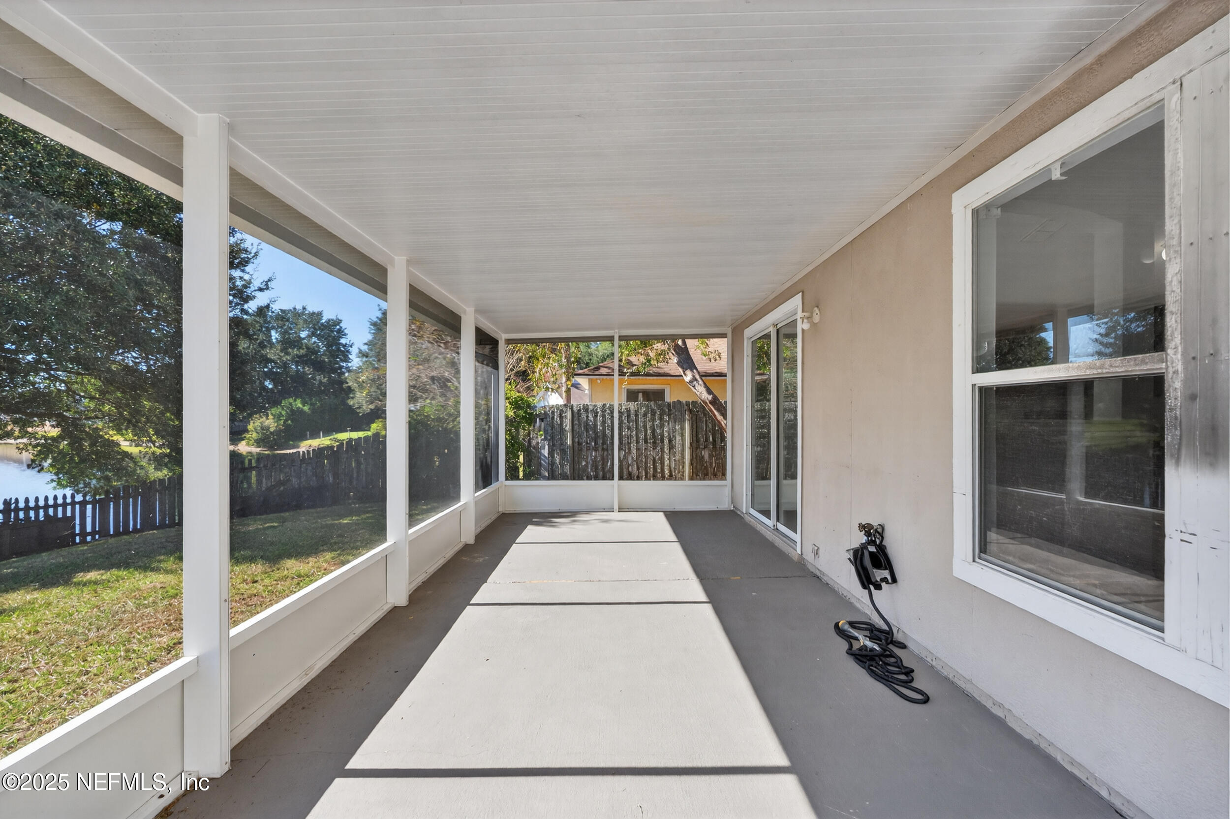10174 Rising Mist Lane Jacksonville, FL 32221 - Photo 28 of 31 a view of a room with a large window