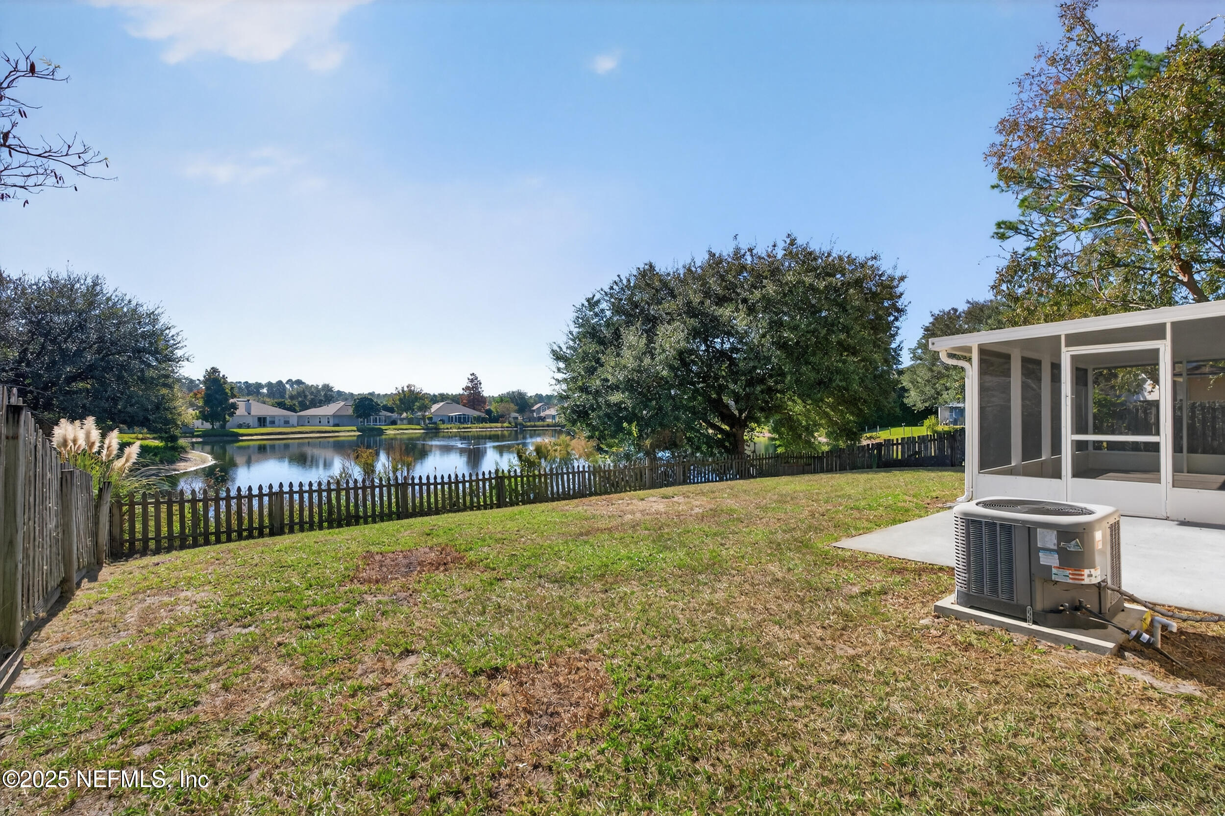 10174 Rising Mist Lane Jacksonville, FL 32221 - Photo 29 of 31 a view of a house with backyard and sitting area
