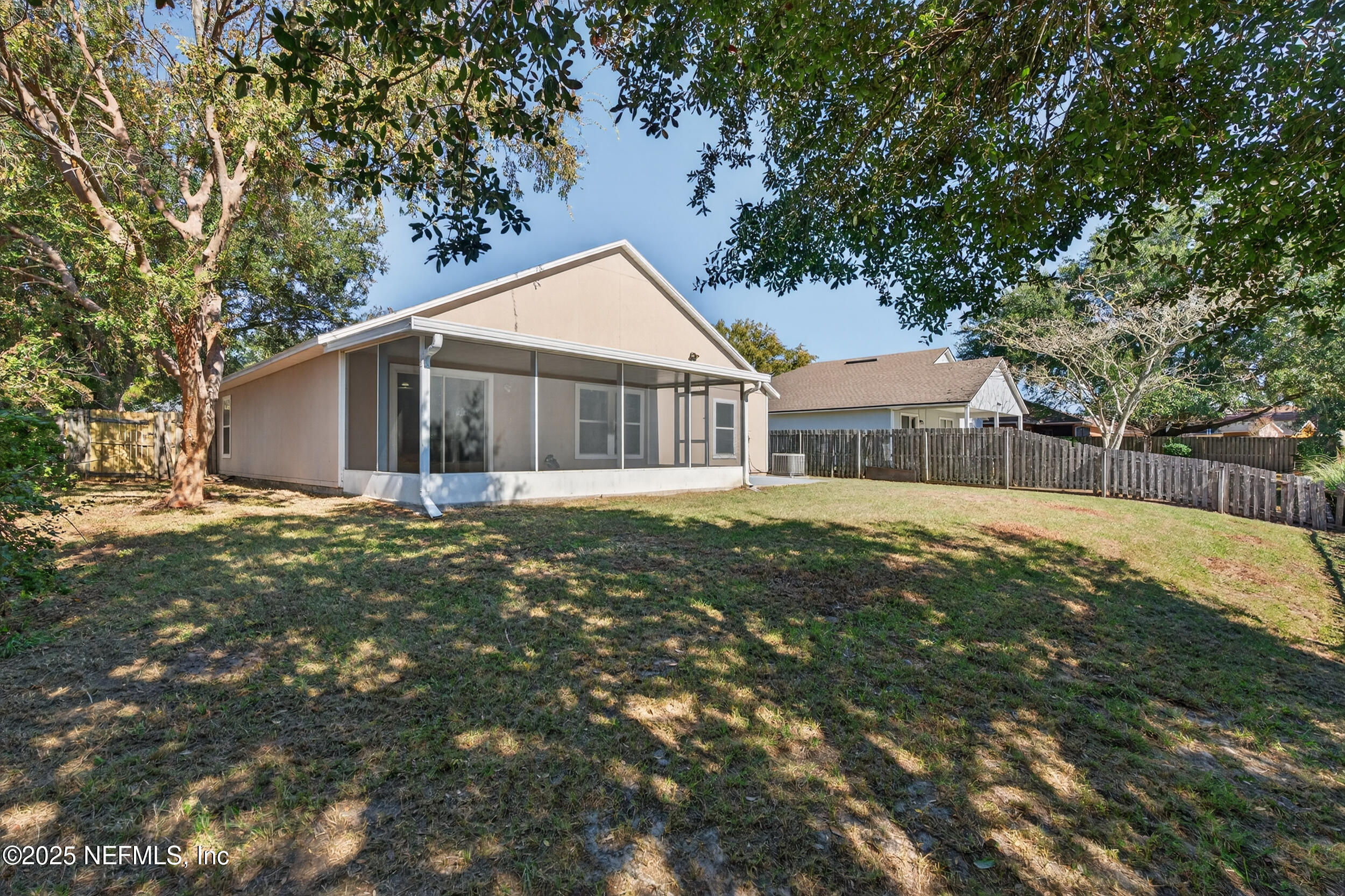 10174 Rising Mist Lane Jacksonville, FL 32221 - Photo 31 of 31 a front view of house with yard and green space