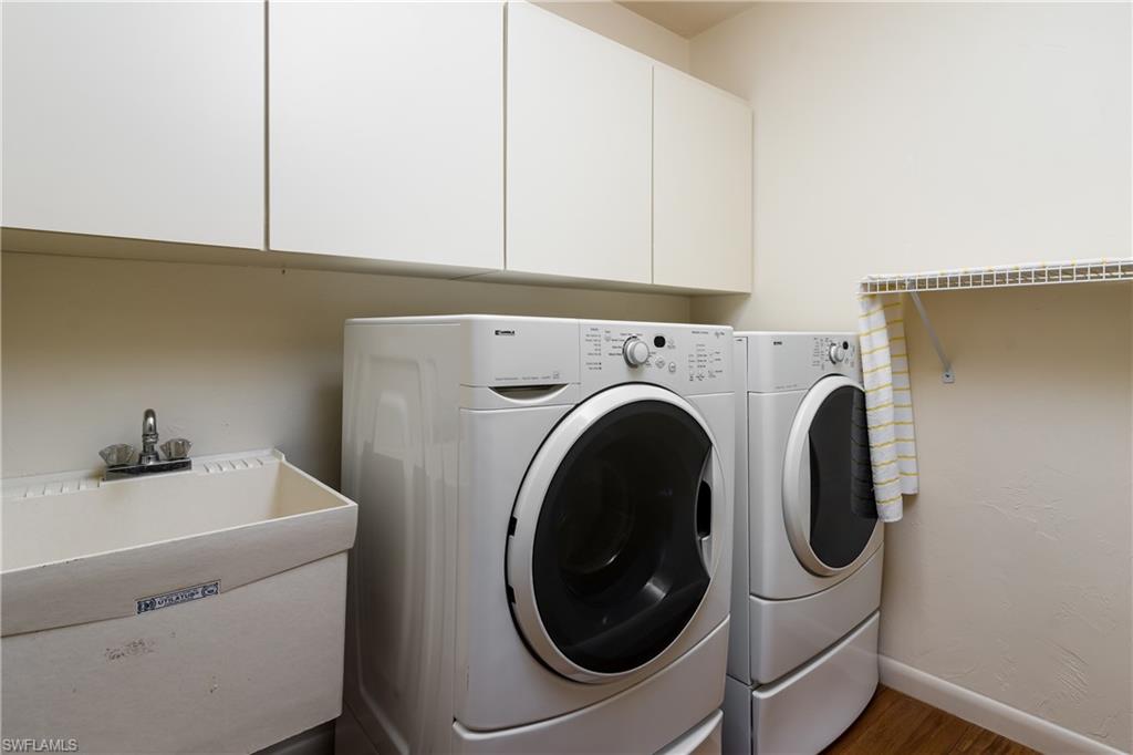 1172 Kings Way Naples, FL 34104 - Photo 39 of 50 a utility room with dryer and washer