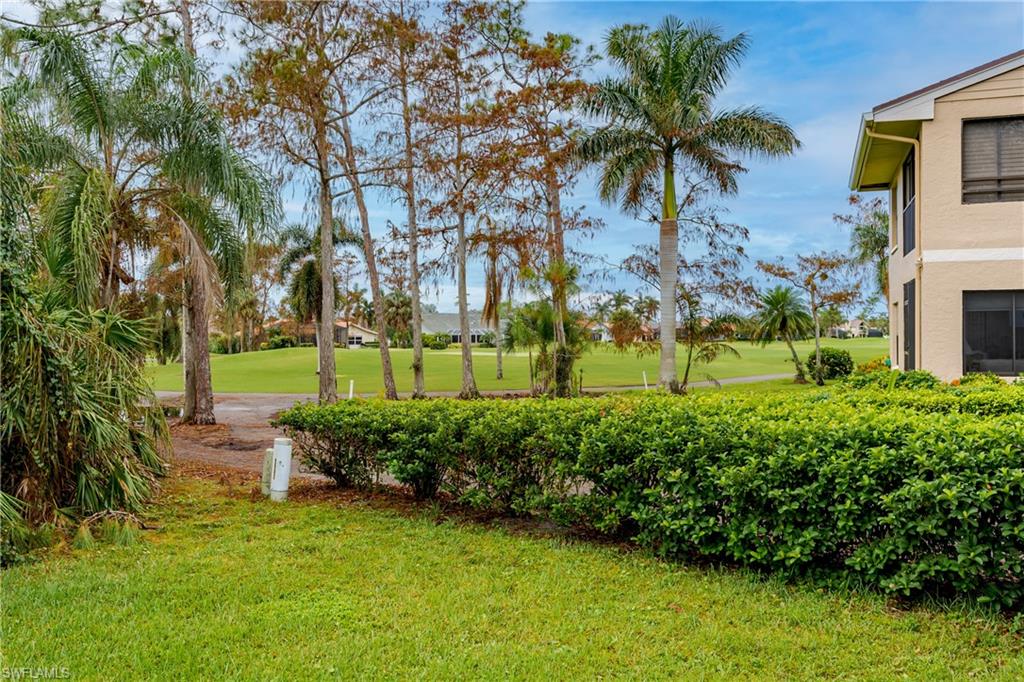 1172 Kings Way Naples, FL 34104 - Photo 41 of 50 a view of a garden