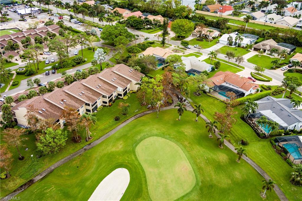 1172 Kings Way Naples, FL 34104 - Photo 47 of 50 an aerial view of residential houses with swimming pool and outdoor space