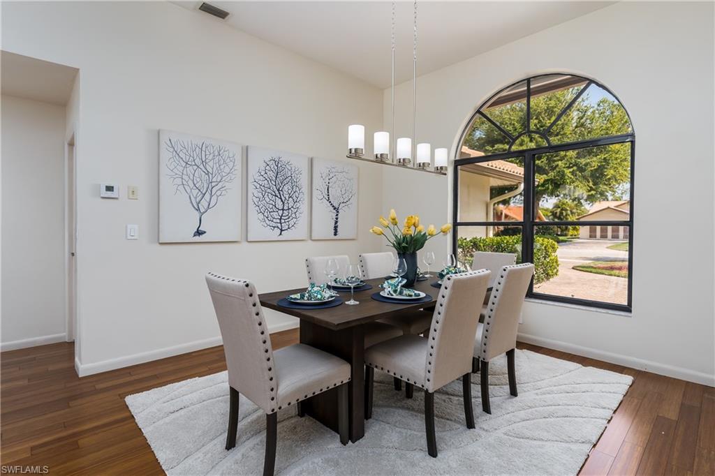 1172 Kings Way Naples, FL 34104 - Photo 6 of 50 a dining room with furniture a rug and a window