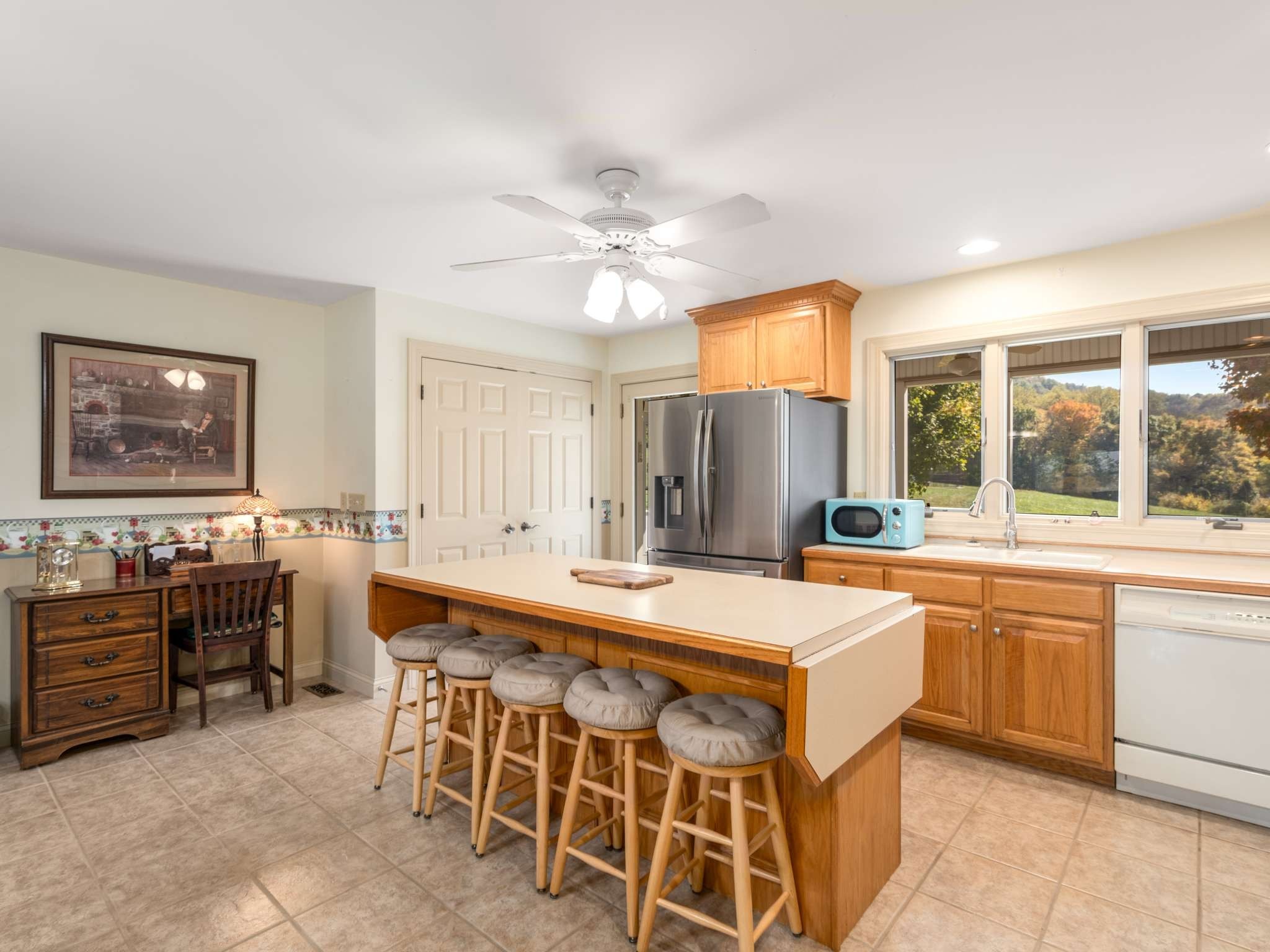 2840 Thomas Road Nolensville, TN 37135 - Photo 12 of 49 a large kitchen with a table and chairs