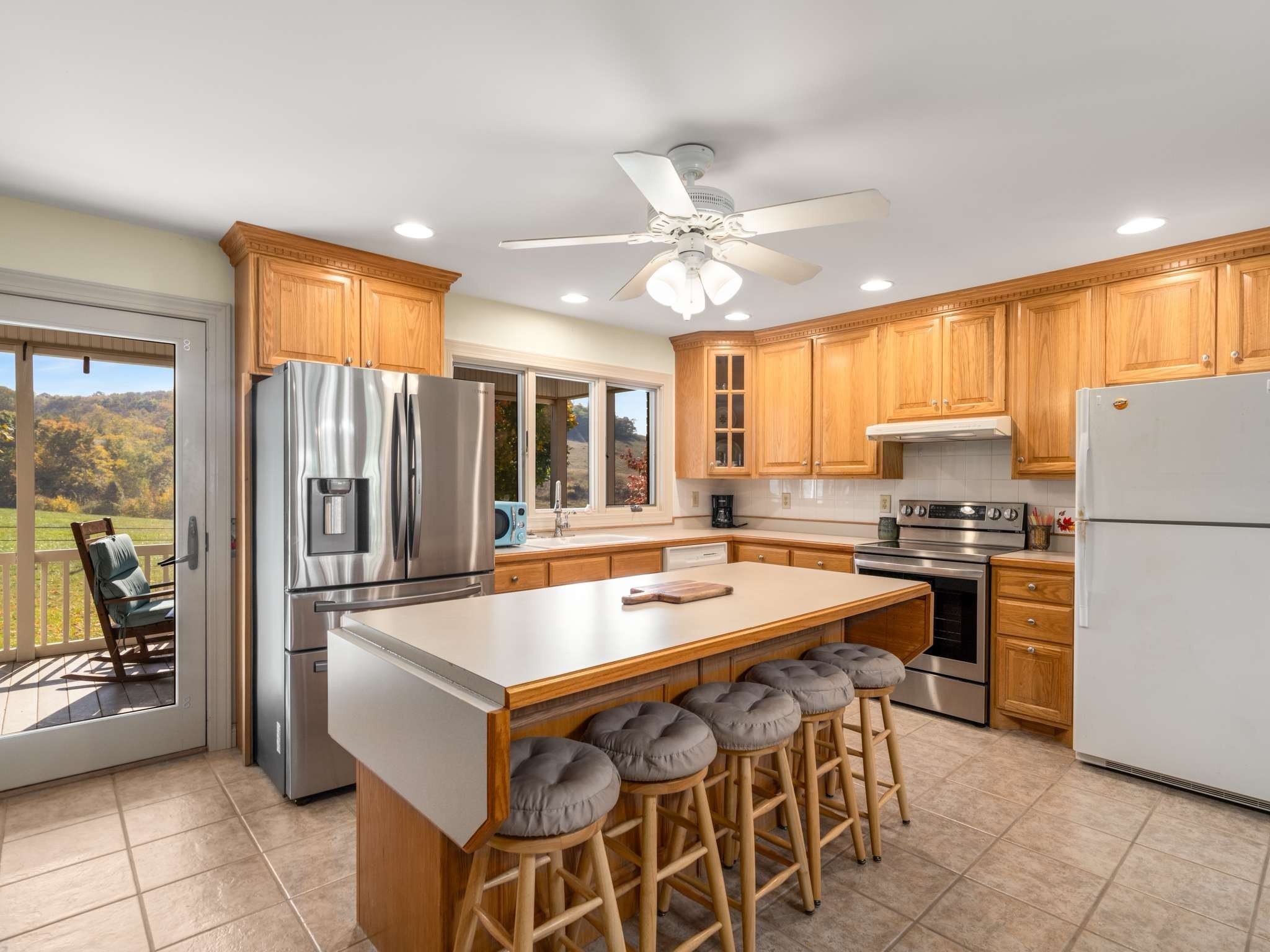 2840 Thomas Road Nolensville, TN 37135 - Photo 13 of 49 a kitchen with a refrigerator a stove a sink and a refrigerator