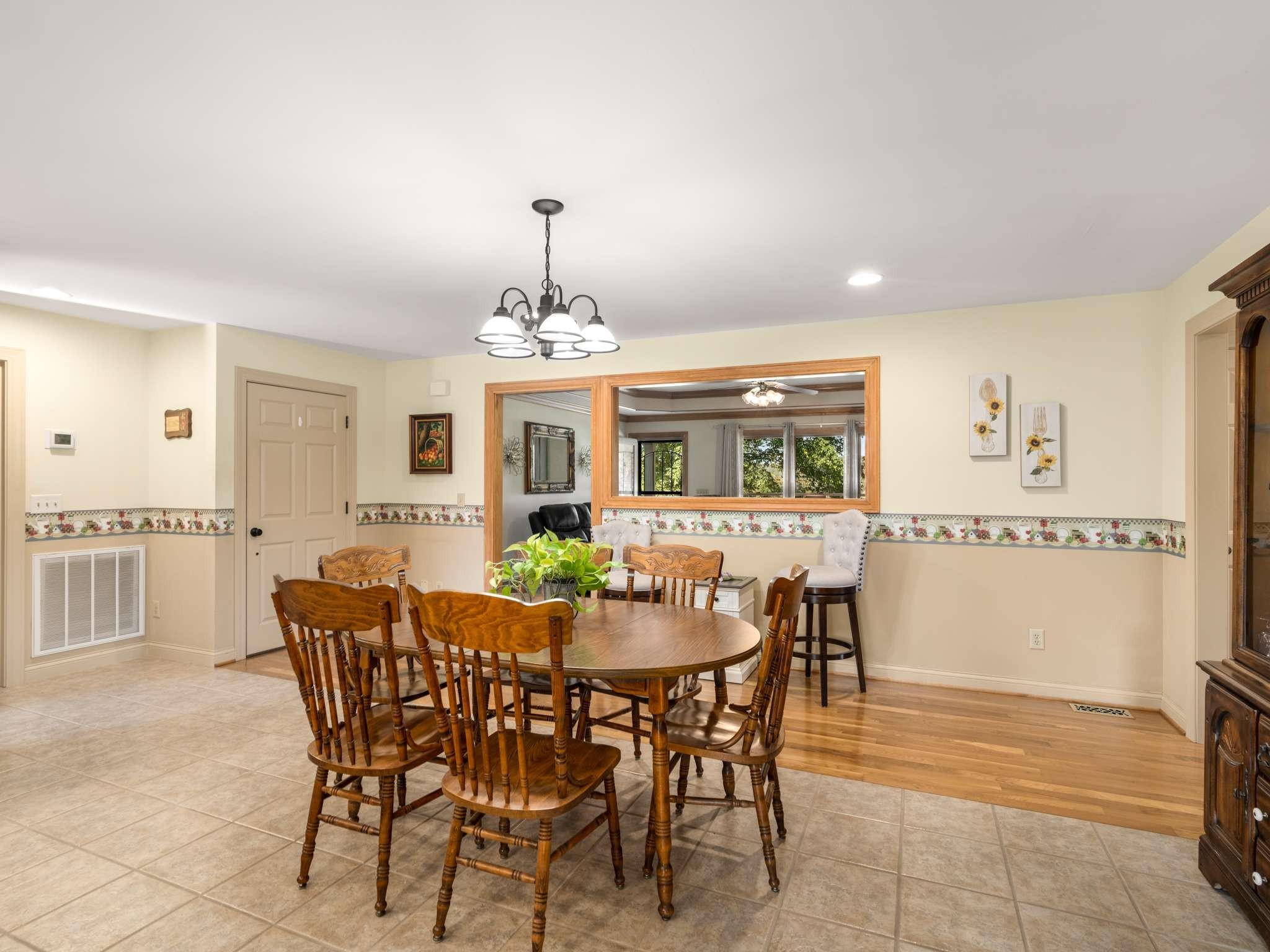 2840 Thomas Road Nolensville, TN 37135 - Photo 14 of 49 a view of a dining room with furniture and chandelier
