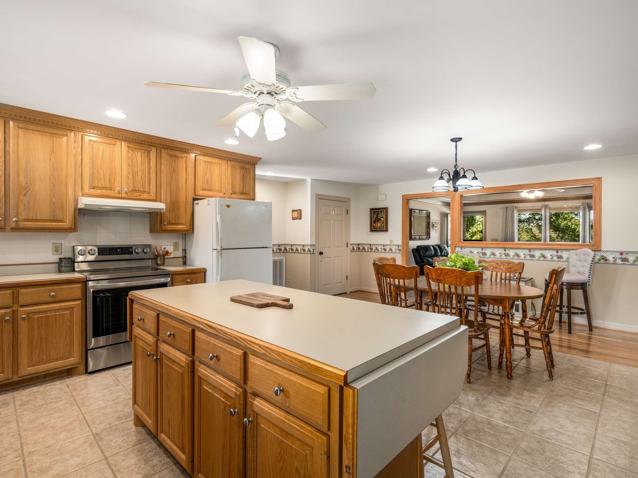 2840 Thomas Road Nolensville, TN 37135 - Photo 17 of 49 a kitchen that has a lot of cabinets a sink and a stove