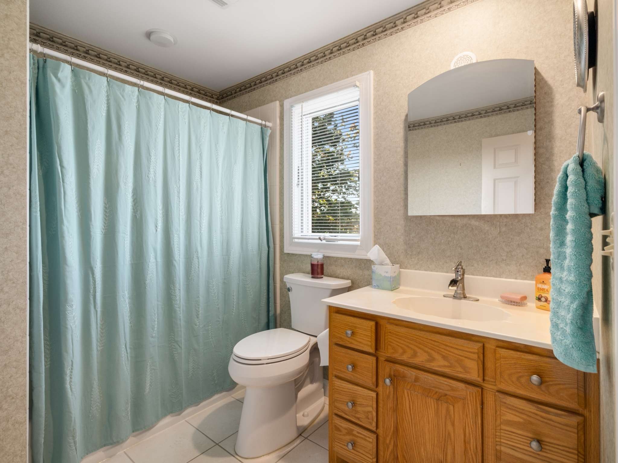 2840 Thomas Road Nolensville, TN 37135 - Photo 21 of 49 a bathroom with a sink toilet and shower