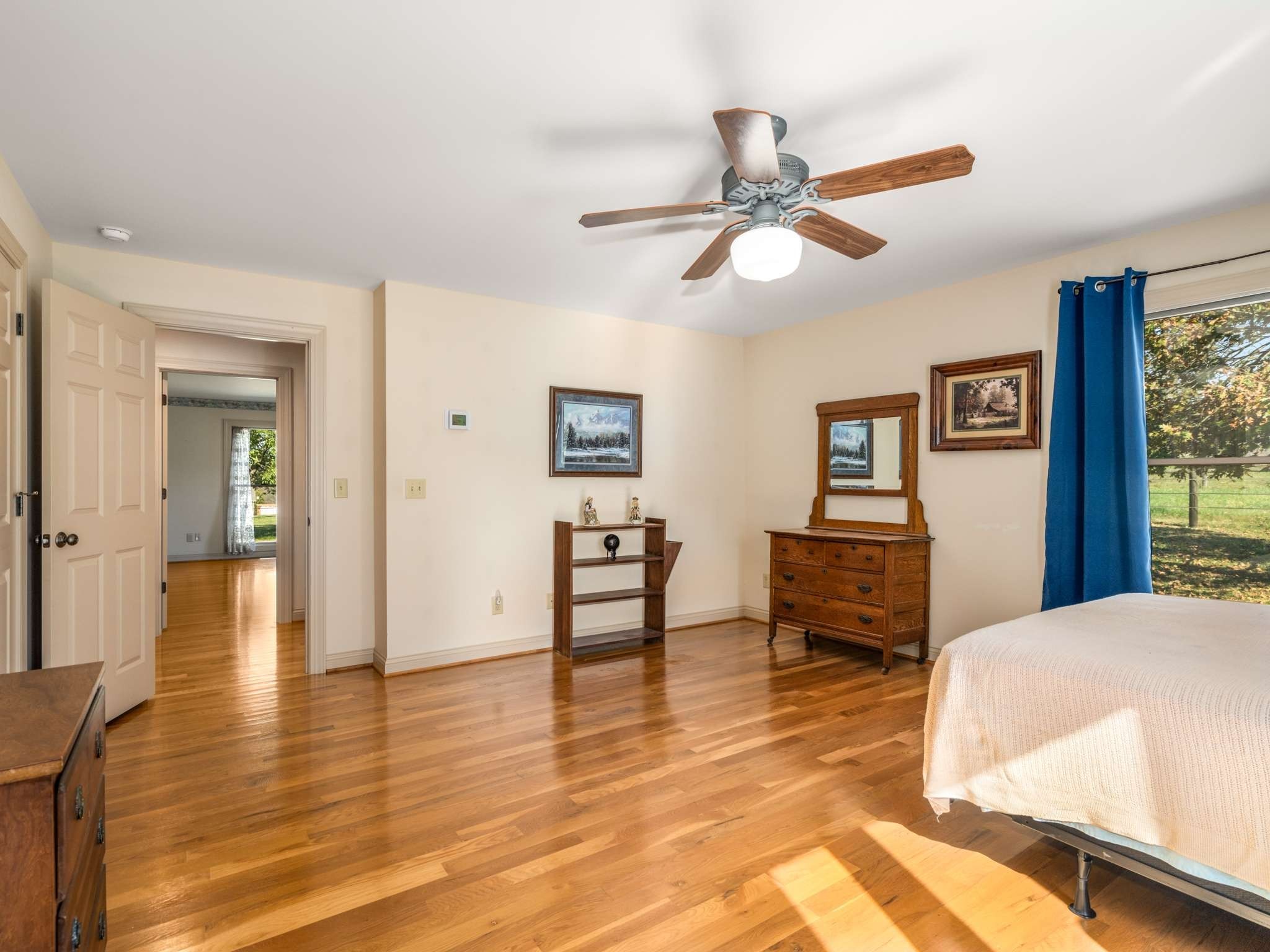 2840 Thomas Road Nolensville, TN 37135 - Photo 24 of 49 a bedroom with a bed and wooden floor