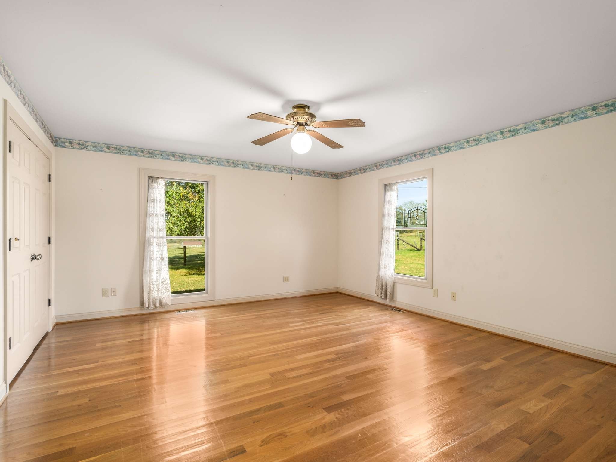 2840 Thomas Road Nolensville, TN 37135 - Photo 27 of 49 wooden floor in an empty room with a window