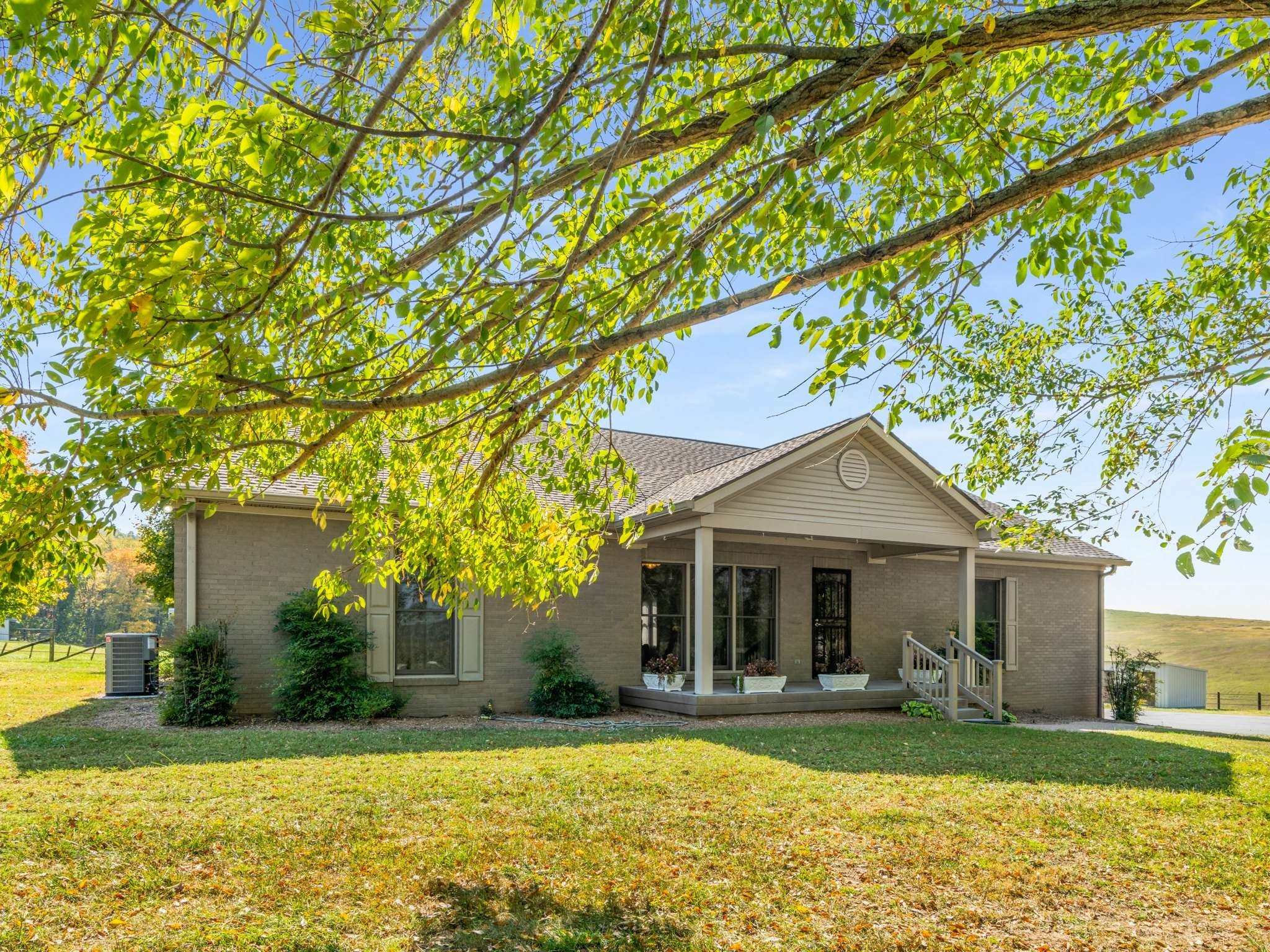 2840 Thomas Road Nolensville, TN 37135 - Photo 5 of 49 a front view of a house with a yard and garage