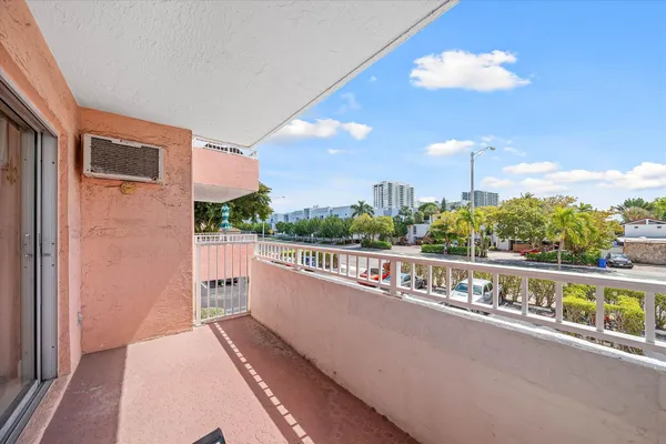 a view of a balcony with city view
