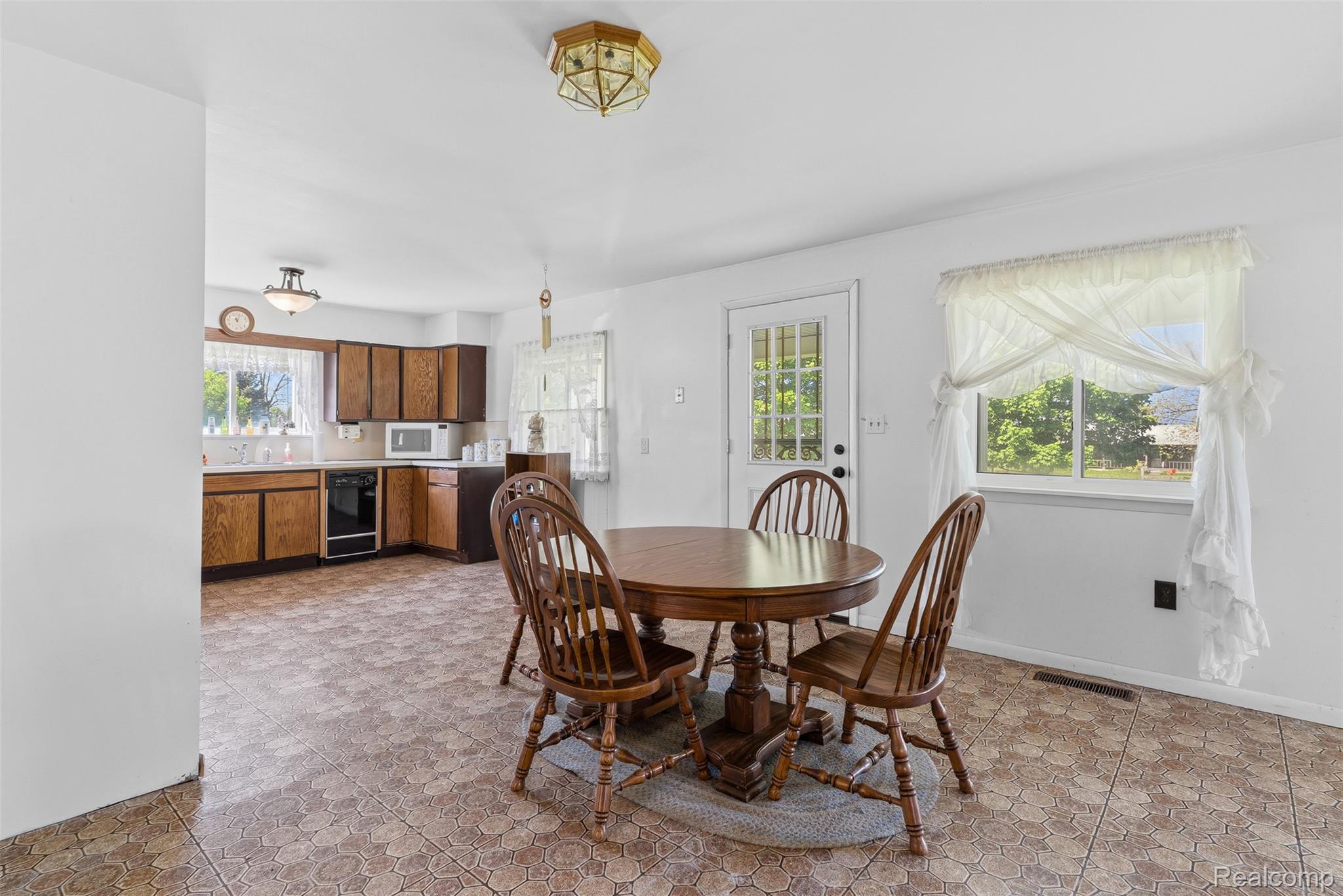 1145 South Washburn Road Lapeer, MI 48446 - Photo 14 of 56 Dining area with baseboards