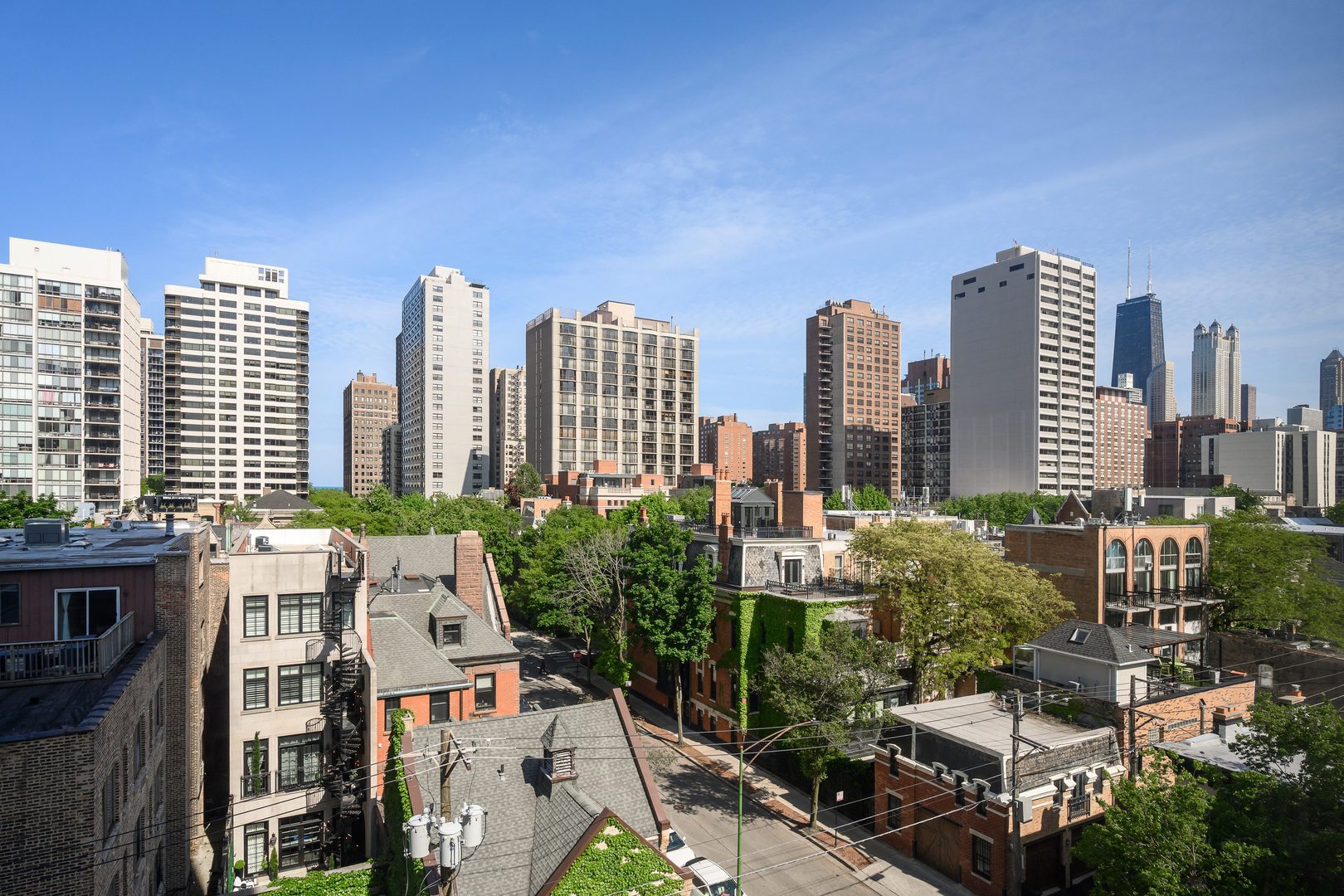 70 West Burton Place, Unit 705 Chicago, IL 60610 - Photo 15 of 17 a view of a city with tall buildings