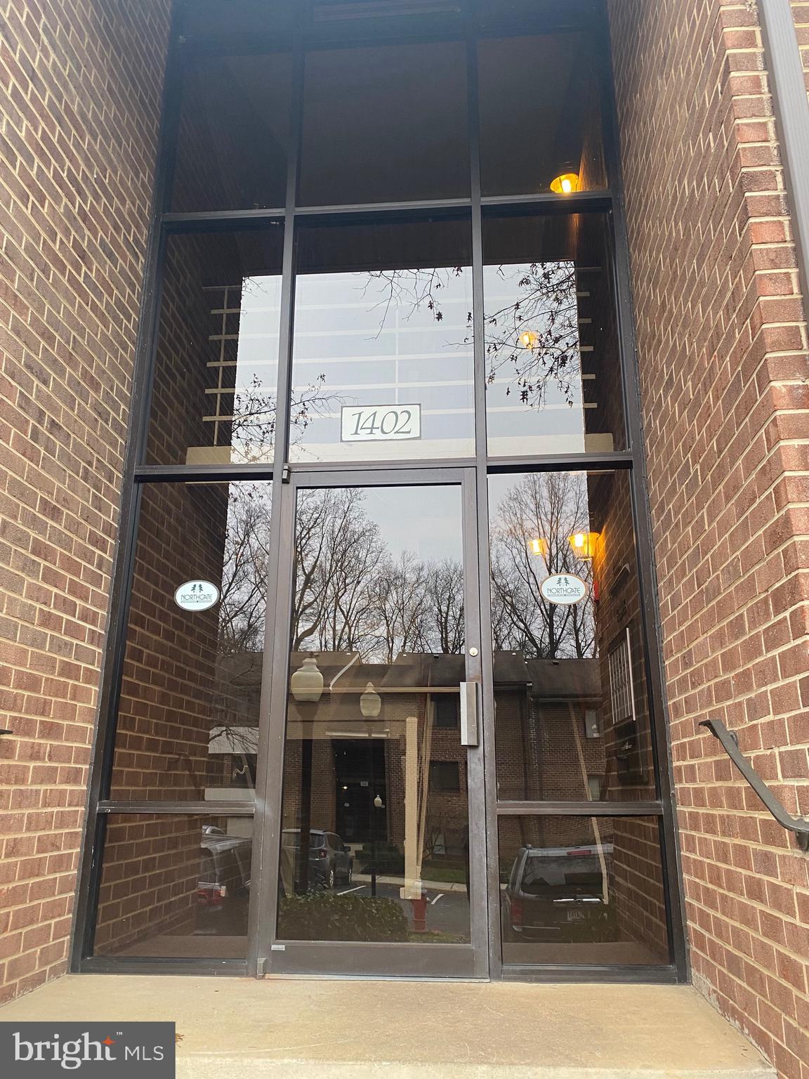 1402 Northgate Square, Unit 12B Reston, VA 20190 - Photo 2 of 14 Solid Brick and Light & Bright Glass