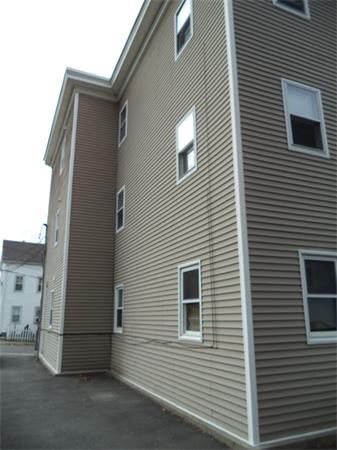 13-15 Amity Street Lynn, MA 01902 - Photo 11 of 15 a view of a house