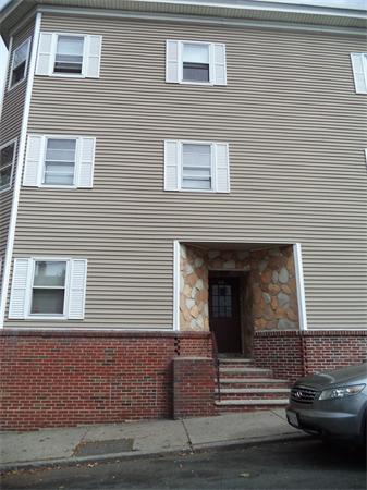 13-15 Amity Street Lynn, MA 01902 - Photo 2 of 15 a front view of a house