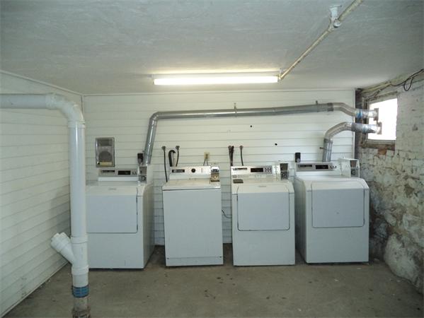 13-15 Amity Street Lynn, MA 01902 - Photo 8 of 15 a room with storage and utility