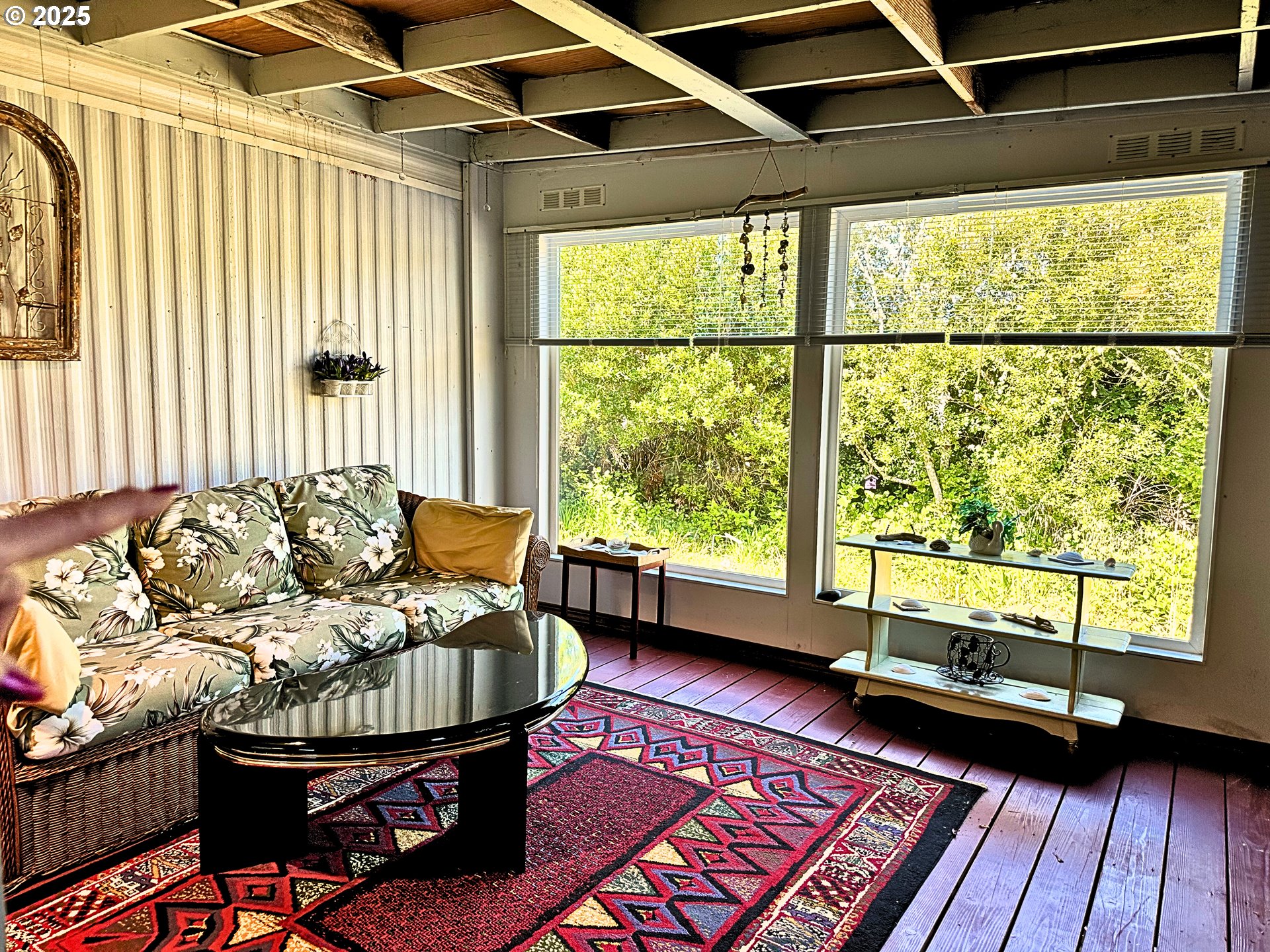 1600 Rhododendron Drive, Unit 218 Florence, OR 97439 - Photo 20 of 40 a living room with furniture and a large window