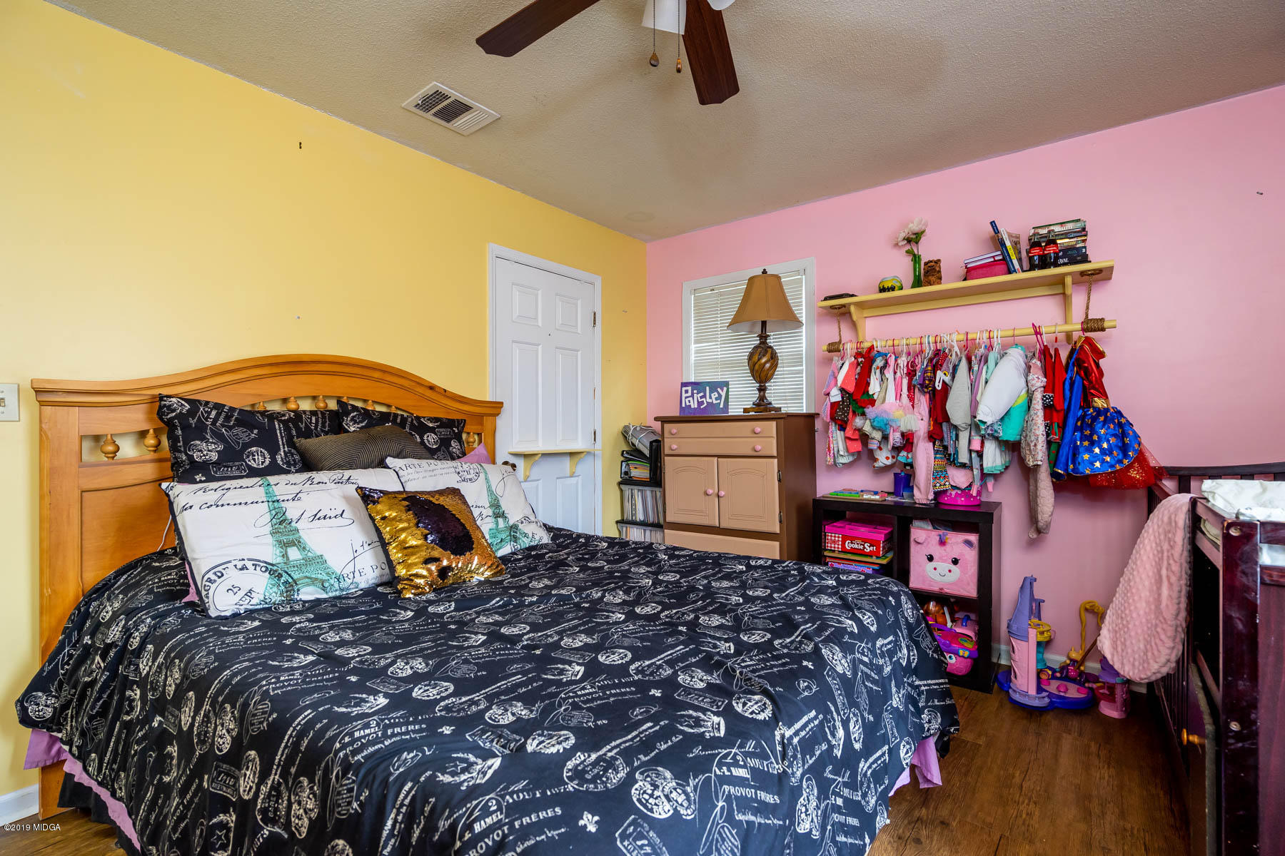 161 Taylor Road Gray, GA 31032 - Photo 11 of 13 a bed sitting in a bedroom next to a window