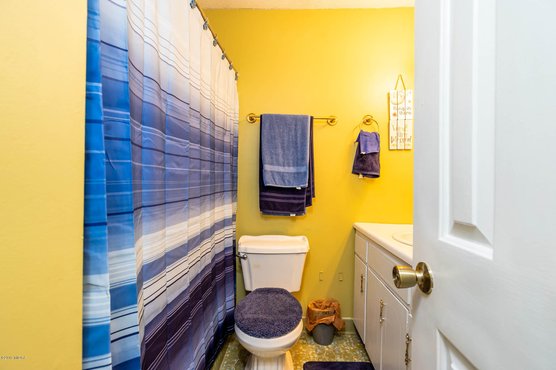161 Taylor Road Gray, GA 31032 - Photo 8 of 13 a bathroom with a toilet and a shower