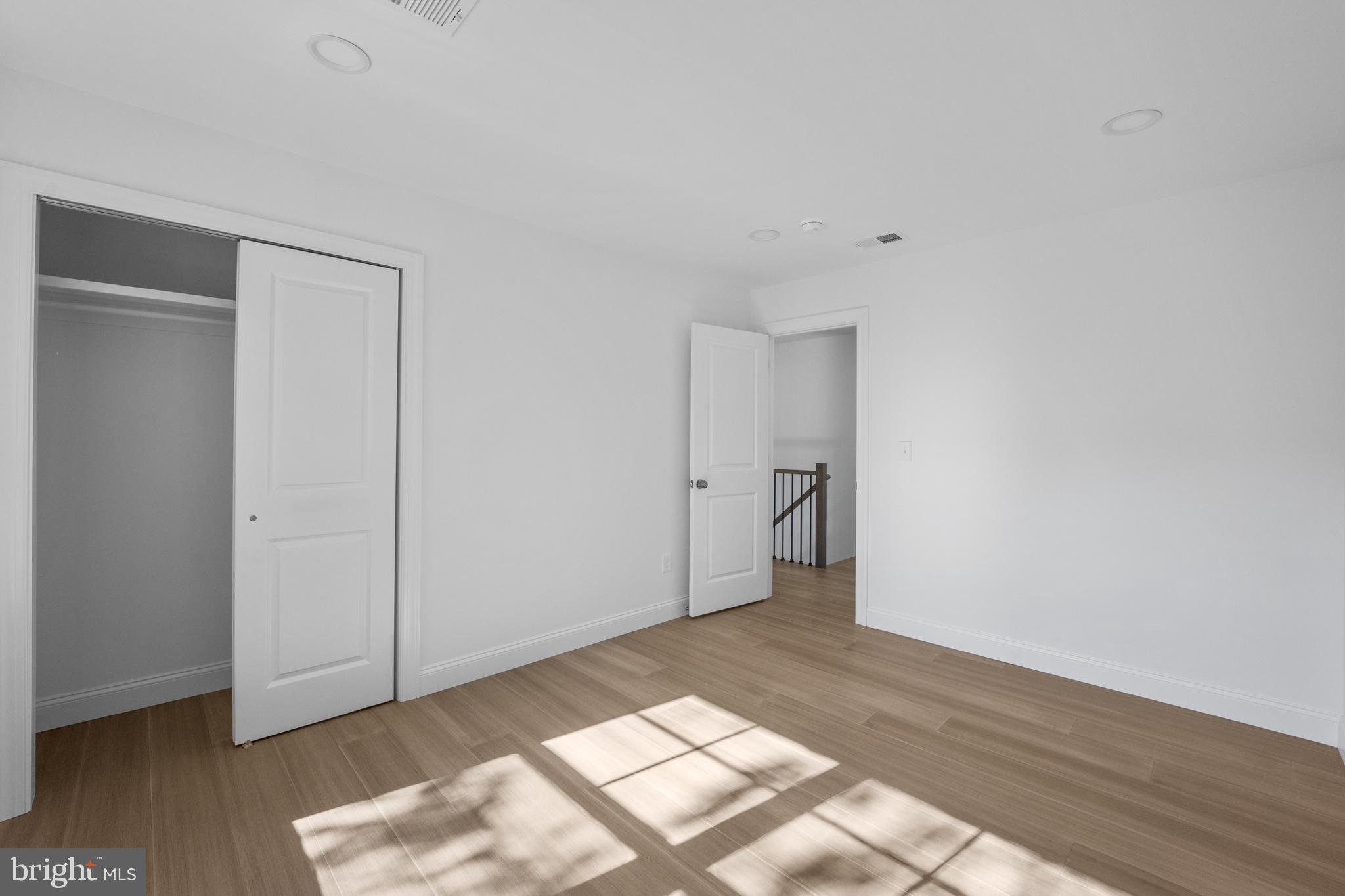 492 Ellis Avenue Lawnside, NJ 08045 - Photo 25 of 33 a view of a room with wooden floor and a window