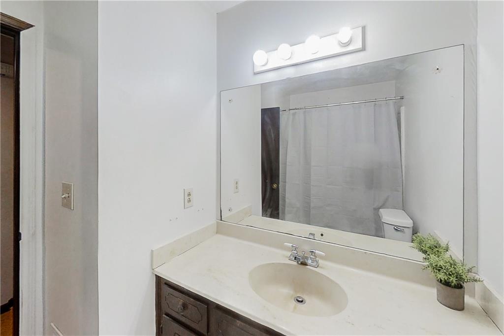 2284 Emerald Springs Drive Decatur, GA 30035 - Photo 7 of 30 a bathroom with a sink and a mirror