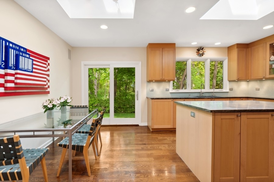 85 Riparian Road Highland Park, IL 60035 - Photo 12 of 31 a kitchen with a large window appliances and cabinets