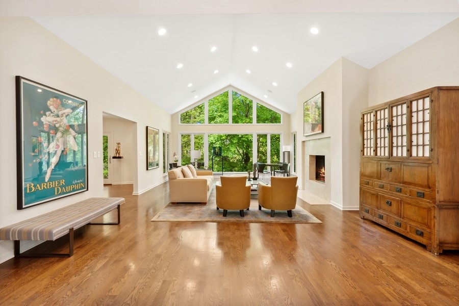 85 Riparian Road Highland Park, IL 60035 - Photo 4 of 31 a living room with furniture and large windows