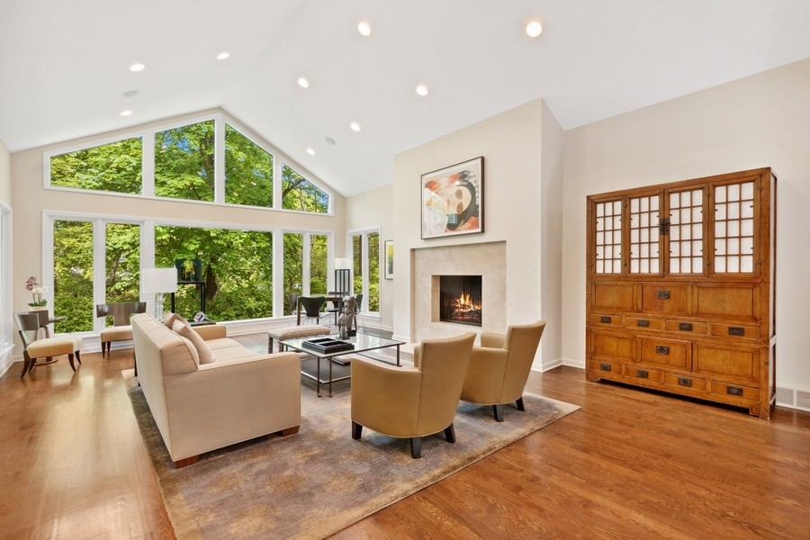 85 Riparian Road Highland Park, IL 60035 - Photo 5 of 31 a living room with furniture and a fireplace