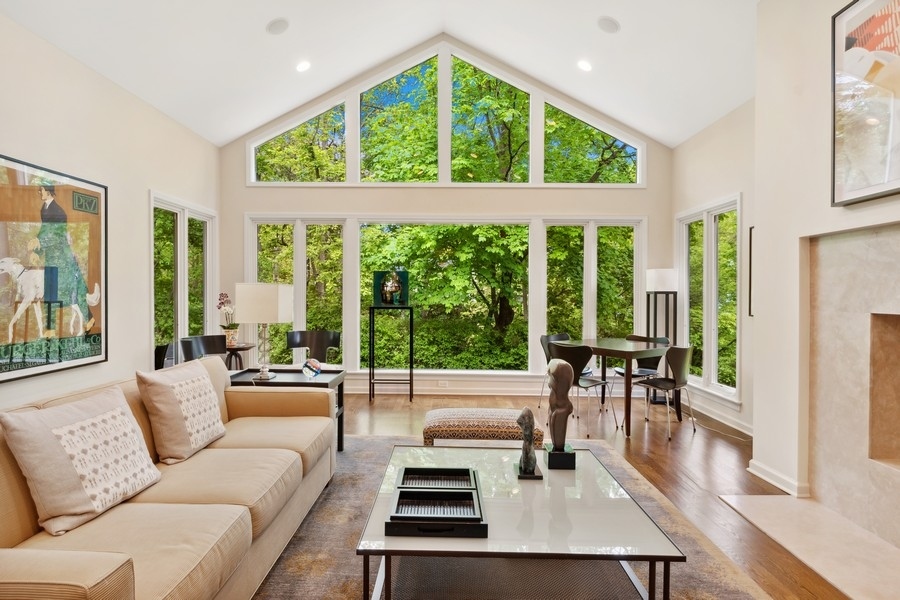 85 Riparian Road Highland Park, IL 60035 - Photo 8 of 31 a living room with furniture and a large window