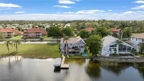 a view of a city with a lake