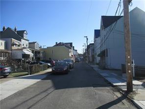 4550 Carroll Street Pittsburgh, PA 15224 - Photo 3 of 4 a view of street along with parked cars