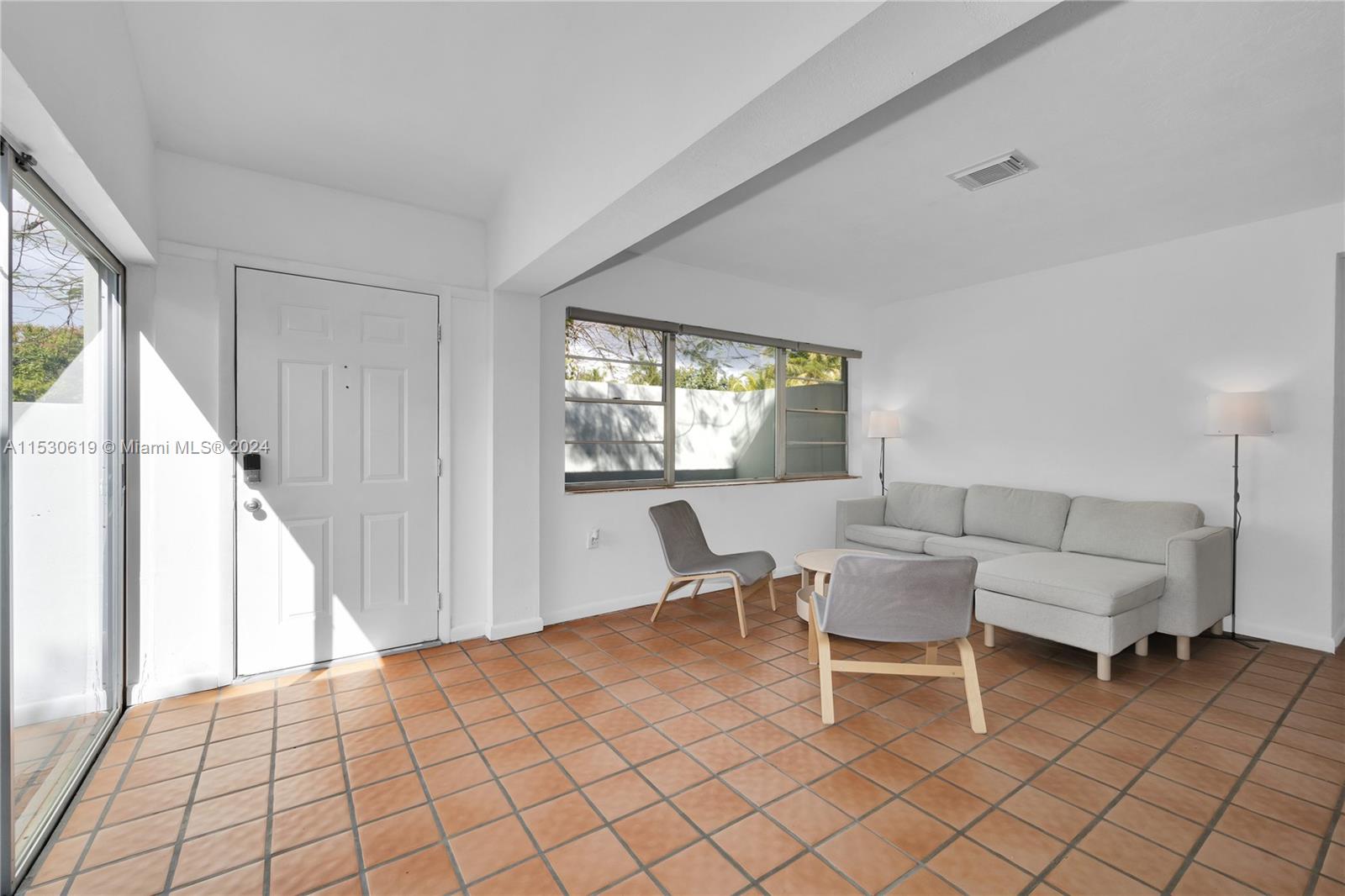 6520 Southwest 46th Street Miami, FL 33155 - Photo 12 of 40 a view of a dining room with furniture window and outside view