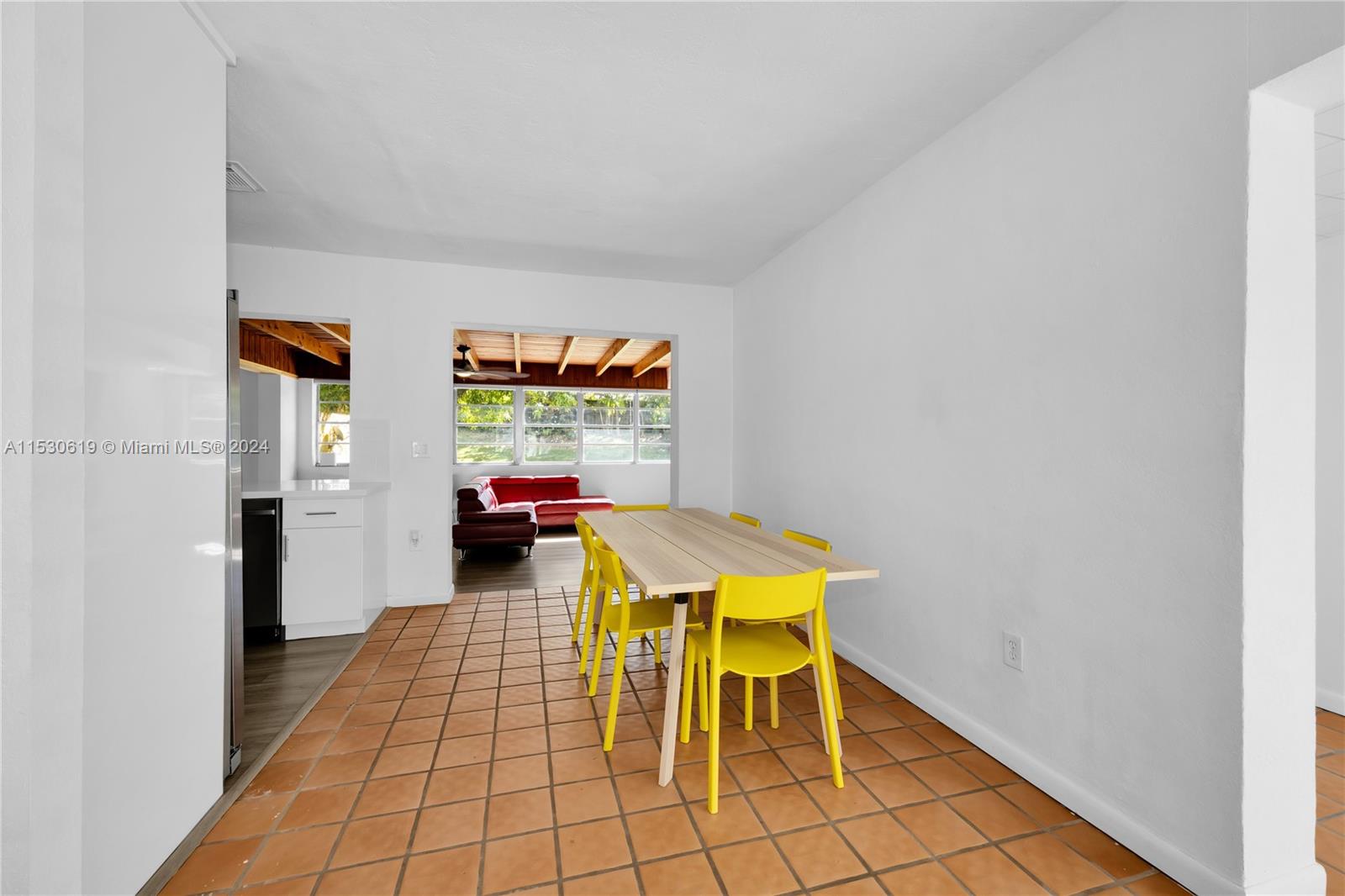 6520 Southwest 46th Street Miami, FL 33155 - Photo 15 of 40 a living room with furniture and a table