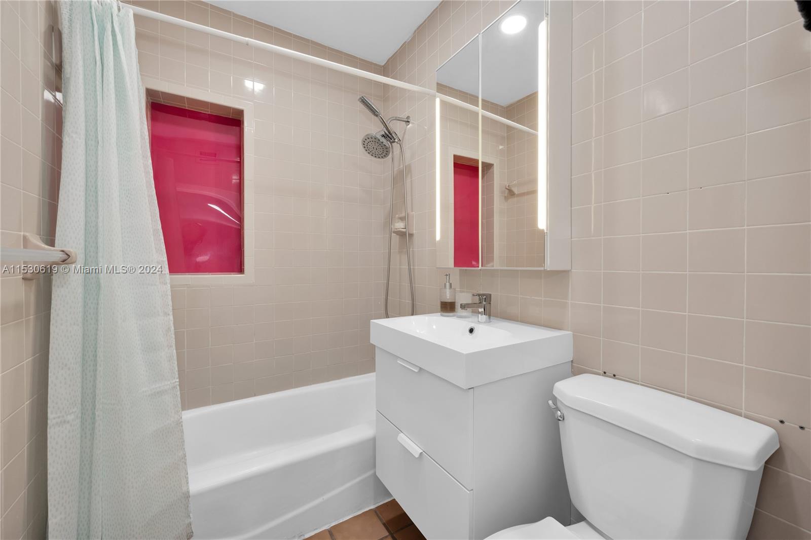 6520 Southwest 46th Street Miami, FL 33155 - Photo 28 of 40 a bathroom with a sink a toilet and shower