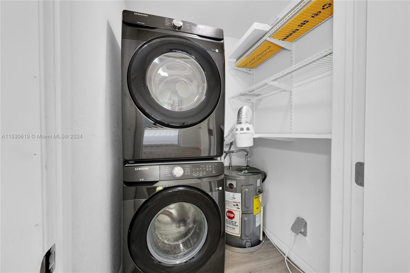 6520 Southwest 46th Street Miami, FL 33155 - Photo 30 of 40 a utility room with dryer and washer