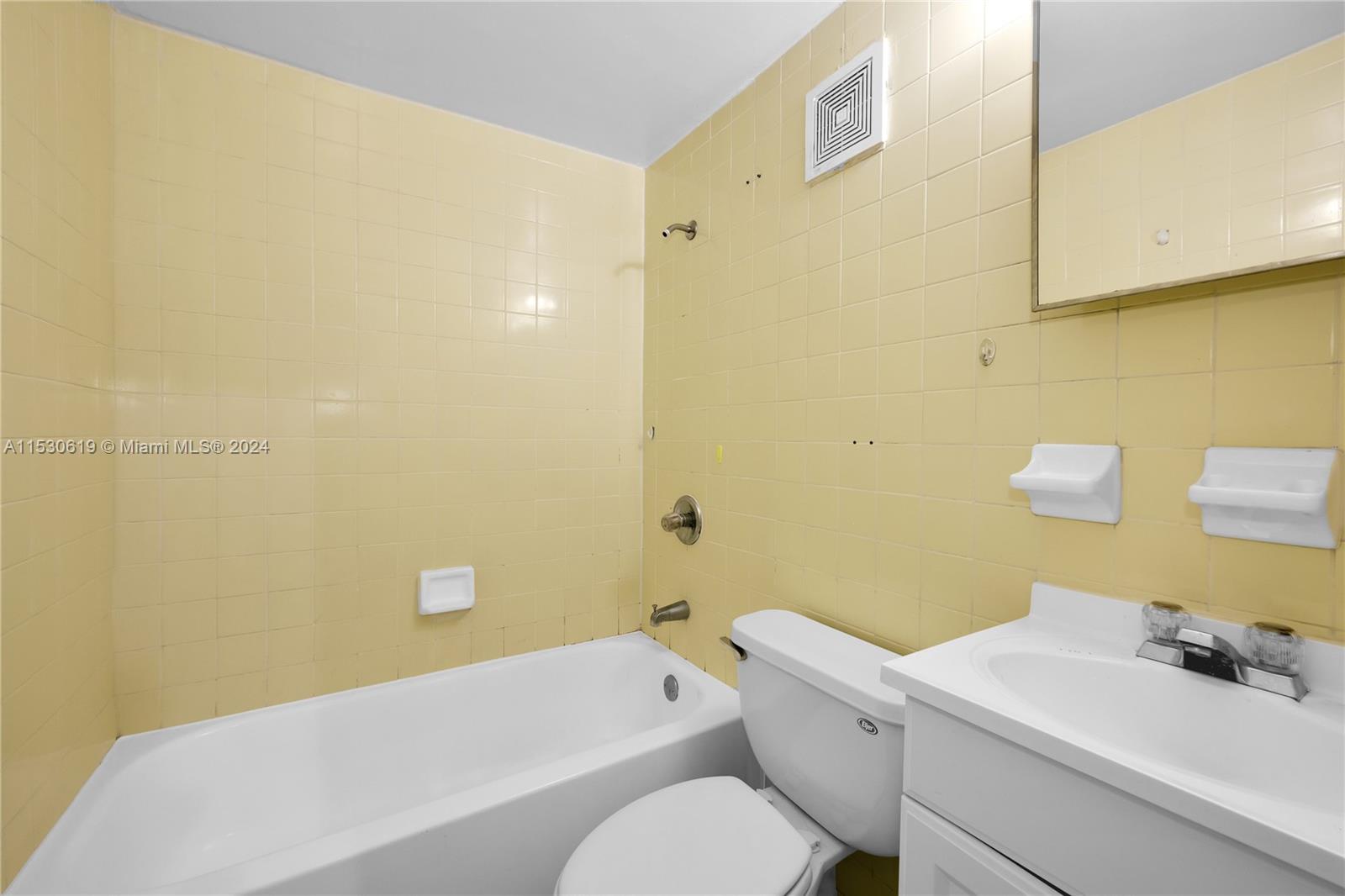 6520 Southwest 46th Street Miami, FL 33155 - Photo 39 of 40 a bathroom with a sink and a bathtub