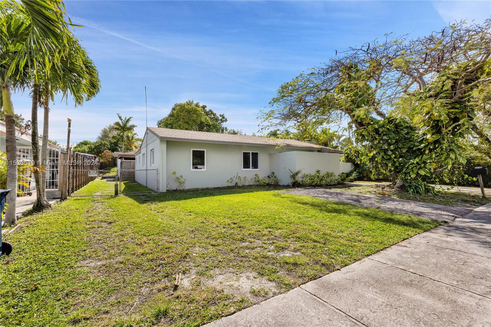 6520 Southwest 46th Street Miami, FL 33155 - Photo 4 of 40 a view of a house with a backyard