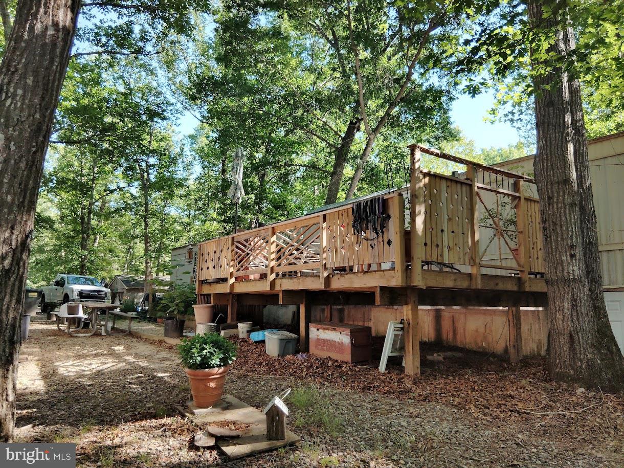 13025 Thunder Road King George, VA 22485 - Photo 4 of 34 Charming deck nestled in nature.