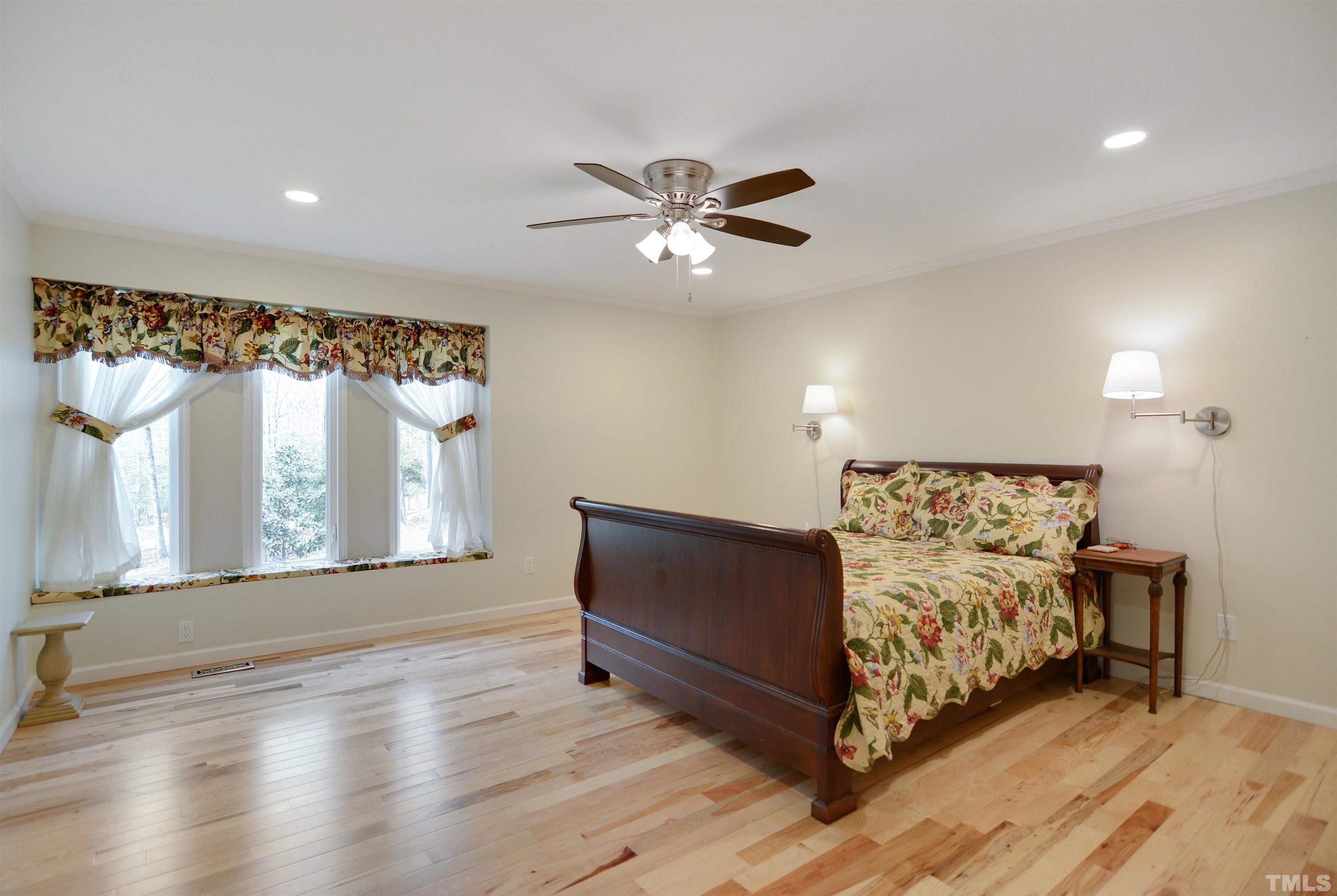 6120 Riverside Drive Wake Forest, NC 27587 - Photo 13 of 26 a living room with furniture and a large window