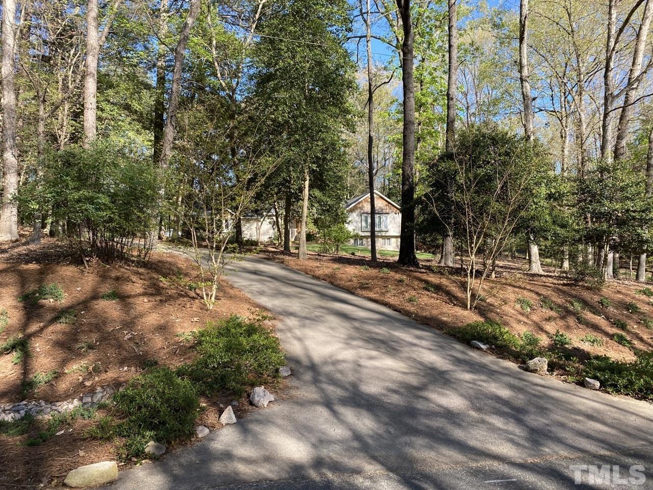 6120 Riverside Drive Wake Forest, NC 27587 - Photo 26 of 26 a view of road with trees