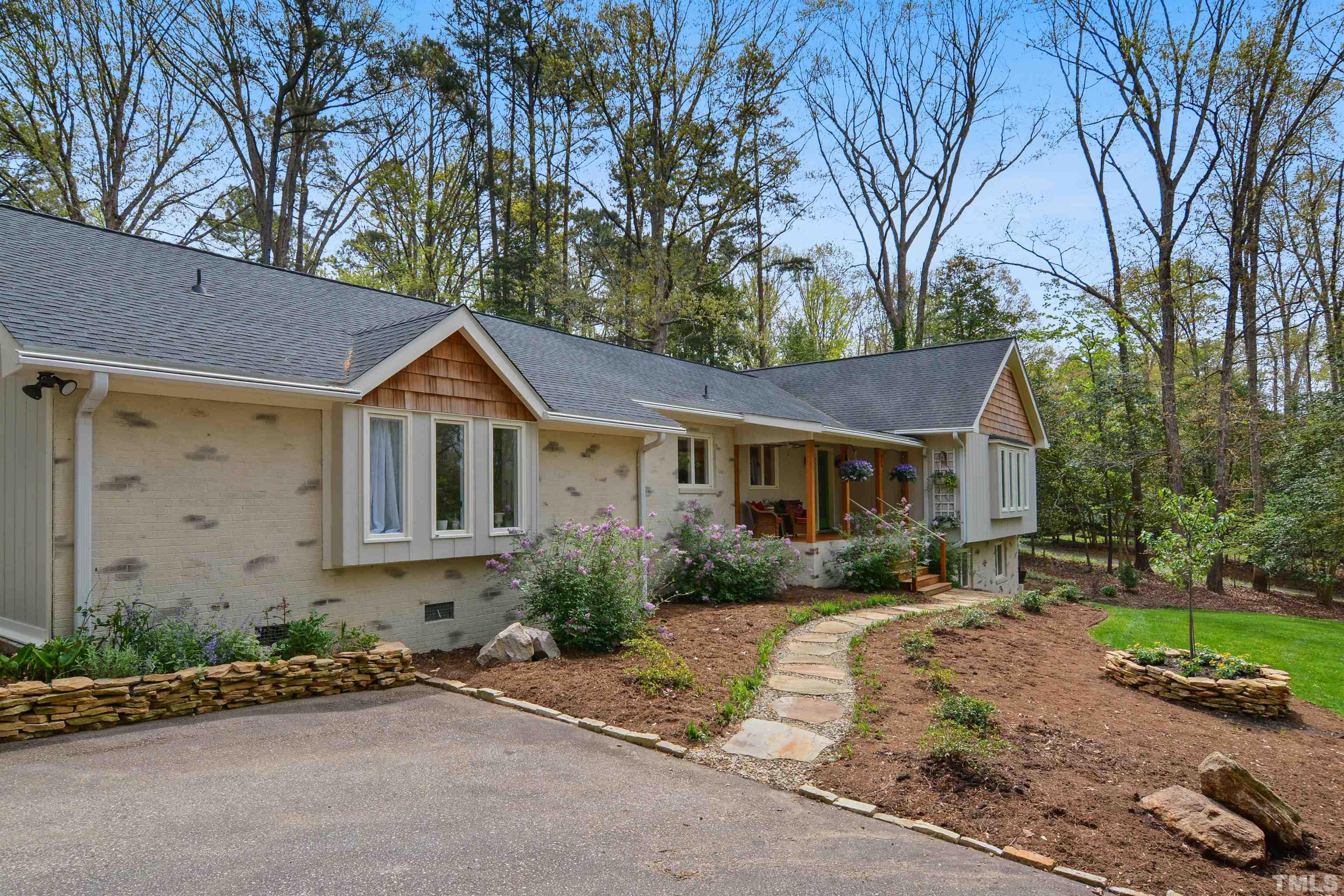 6120 Riverside Drive Wake Forest, NC 27587 - Photo 3 of 26 a view of a yard in front of a house with large tree