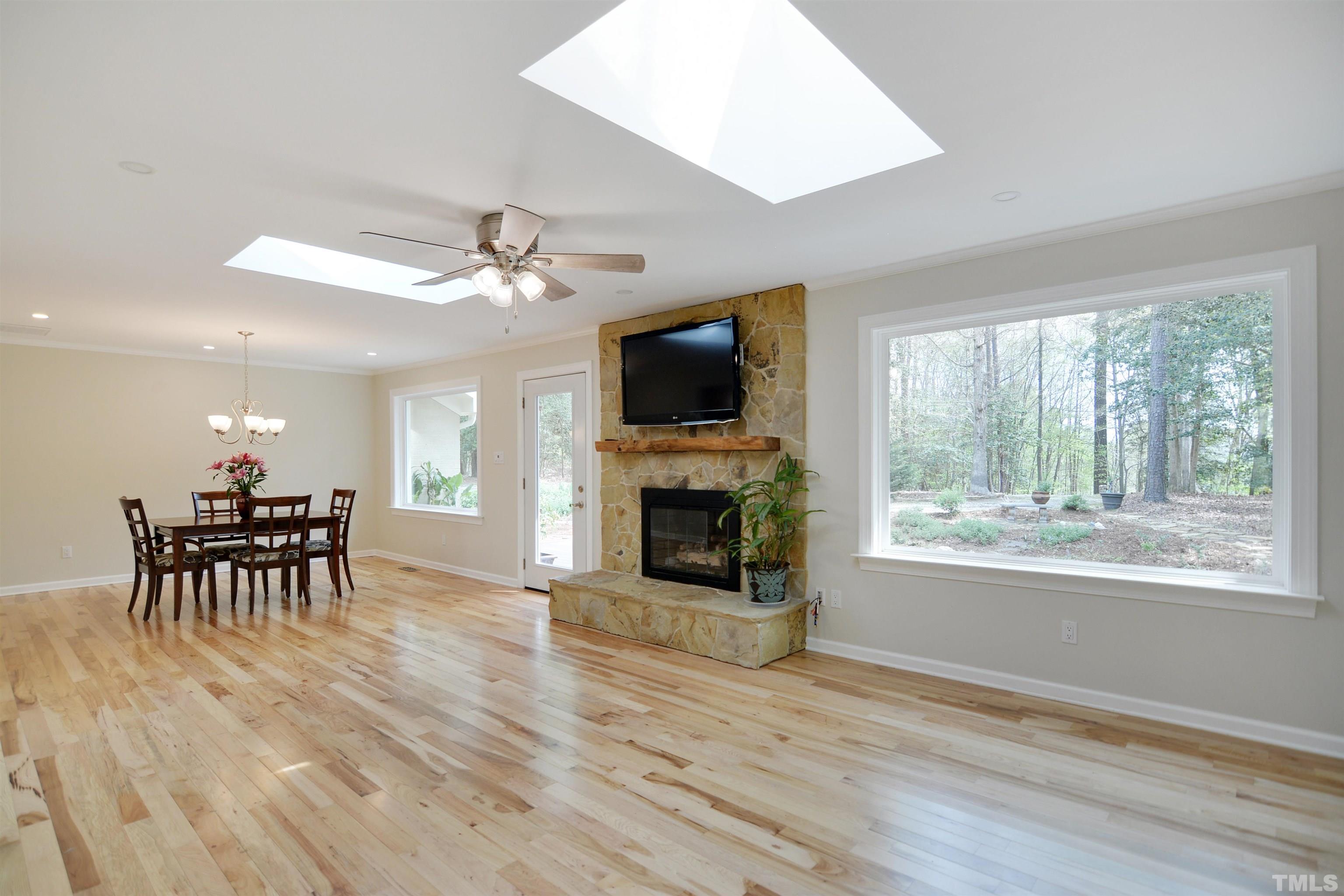 6120 Riverside Drive Wake Forest, NC 27587 - Photo 6 of 26 a view of a livingroom with furniture and a fireplace