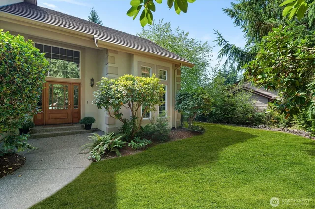 a view of a house with a garden