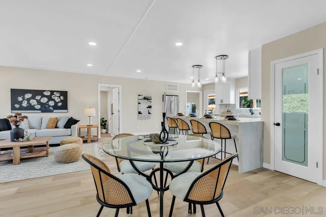 13725 Adrian Street Poway, CA 92064 - Photo 14 of 52 a view of a dining room with furniture and wooden floor