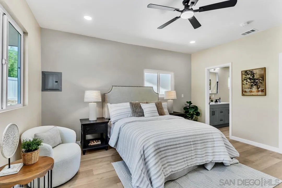 13725 Adrian Street Poway, CA 92064 - Photo 17 of 52 a bedroom with a bed furniture and a window